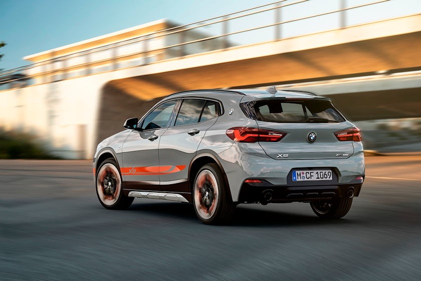 2023 bmw x2 driving back view ca
