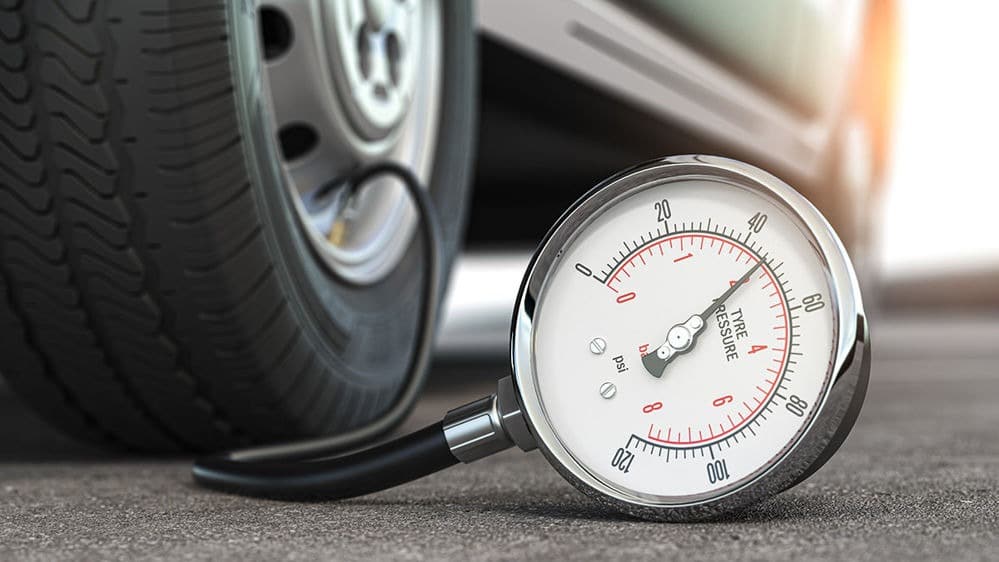 How to check car tire pressure without using a gauge